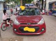 Hyundai Grand i10  1.0 MT Base 2015 - Xe Hyundai Grand i10 1.0 MT Base sản xuất năm 2015, màu đỏ, nhập khẩu nguyên chiếc xe gia đình