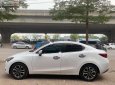 Mazda 2 1.5 AT 2015 - Xe Mazda 2 1.5 AT năm 2015, màu trắng chính chủ giá cạnh tranh