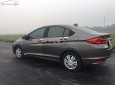 Honda City 2015 - Cần bán xe Honda City đời 2015, màu nâu, giá 390tr xe còn mới nguyên