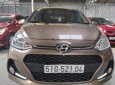 Hyundai Grand i10 2017 - Bán xe Hyundai Grand i10 sản xuất năm 2017, màu nâu, 375tr xe còn mới