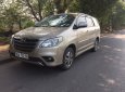 Toyota Innova E 2015 - Bán ô tô Toyota Innova E 2015, màu nâu