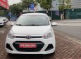 Hyundai Grand i10 1.0 MT 2014 - Bán ô tô Hyundai Grand i10 1.0 MT sản xuất 2014, màu trắng, nhập khẩu nguyên chiếc, số sàn, 260tr