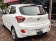 Hyundai Grand i10 1.0 MT 2014 - Bán ô tô Hyundai Grand i10 1.0 MT sản xuất 2014, màu trắng, nhập khẩu nguyên chiếc, số sàn, 260tr