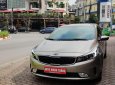 Kia Cerato 2.0 2016 - Bán Kia Cerato 2.0 AT đời 2016, màu ghi vàng, giá tốt