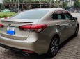 Kia Cerato 2.0 2016 - Bán Kia Cerato 2.0 AT đời 2016, màu ghi vàng, giá tốt