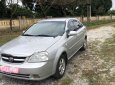 Daewoo Lacetti 2009 - Cần bán Daewoo Lacetti đời 2009, màu bạc