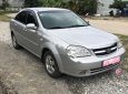 Daewoo Lacetti 2009 - Cần bán Daewoo Lacetti đời 2009, màu bạc