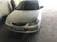 Mazda 323 2003 - Cần bán Mazda 323 đời 2003, màu bạc giá cạnh tranh