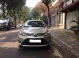 Toyota Vios 1.5E 2016 - Tôi cần bán chiếc xe ô tô Toyota Vios 1.5E màu ghi vàng 2016