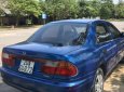 Mazda 323   2000 - Cần bán lại xe Mazda 323 đời 2000, màu xanh lam