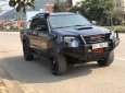 Toyota Hilux 2012 - Cần bán lại xe Toyota Hilux MT đời 2012, màu đen xe gia đình