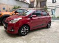 Hyundai Grand i10 2017 - Bán Hyundai Grand i10 AT sản xuất năm 2017, màu đỏ số tự động