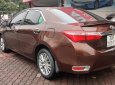 Toyota Corolla altis 1.8 2015 - Bán xe Toyota Corolla altis 1.8 AT 2015, màu nâu