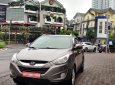 Hyundai Tucson 2.0  2011 - Cần bán xe Hyundai Tucson 2.0 AT 4WD 2011, màu ghi