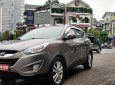 Hyundai Tucson 2.0  2011 - Cần bán xe Hyundai Tucson 2.0 AT 4WD 2011, màu ghi