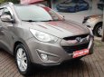 Hyundai Tucson 2.0  2011 - Cần bán xe Hyundai Tucson 2.0 AT 4WD 2011, màu ghi