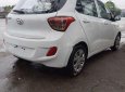 Hyundai Grand i10     2014 - Cần bán Hyundai Grand i10 sản xuất 2014, màu trắng, xe nhập chính chủ, giá tốt