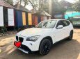 BMW X1   2010 - Cần bán gấp BMW X1 2010, màu trắng, xe nhập