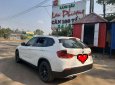 BMW X1   2010 - Cần bán gấp BMW X1 2010, màu trắng, xe nhập