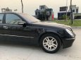 Mercedes-Benz E class   2003 - Bán xe Mercedes E class đời 2003, màu đen, 240 triệu