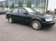 Toyota Corolla 2000 - Bán ô tô Toyota Corolla đời 2000, màu đen giá cạnh tranh