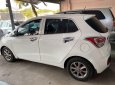 Hyundai Grand i10    2015 - Cần bán lại xe Hyundai Grand i10 sản xuất năm 2015, màu trắng, nhập khẩu nguyên chiếc, giá 245tr