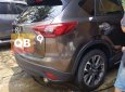 Mazda CX 5 2016 - Cần bán xe Mazda CX 5 năm sản xuất 2016, màu nâu, 650 triệu