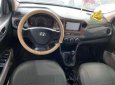 Hyundai Grand i10    2015 - Cần bán lại xe Hyundai Grand i10 sản xuất năm 2015, màu trắng, nhập khẩu nguyên chiếc, giá 245tr