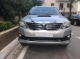 Toyota Fortuner 2014 - Cần bán Toyota Fortuner năm 2014, màu bạc số sàn, giá 606tr