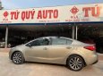 Kia K3   2015 - Cần bán xe Kia K3 1.6AT đời 2015, màu vàng cát, giá tốt