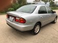 Mazda 323 1999 - Cần bán gấp Mazda 323 năm 1999, màu bạc, giá chỉ 85 triệu