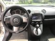 Mazda 2 2S 2014 - Gia đình cần bán Mazda 2 2S đời 2014, màu trắng, giá tốt