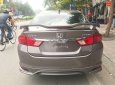 Honda City 2016 - Cần bán xe Honda City 1.5AT sản xuất năm 2016, màu nâu