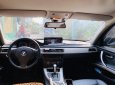 BMW 3 Series   2010 - Bán ô tô BMW 320i đời 2010, màu bạc, nhập khẩu