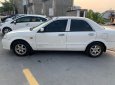 Mazda 323F 2004 - Cần bán gấp Mazda 323F GLX đời 2004, màu trắng