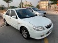 Mazda 323F 2004 - Cần bán gấp Mazda 323F GLX đời 2004, màu trắng