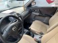 Mazda 323F 2004 - Cần bán gấp Mazda 323F GLX đời 2004, màu trắng