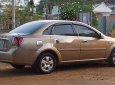 Daewoo Lacetti 2005 - Cần bán Daewoo Lacetti năm sản xuất 2005, màu vàng, xe nhập, 150tr