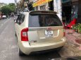 Kia Carens 2010 - Bán xe Kia Carens AT đời 2010, màu vàng chính chủ, 300tr