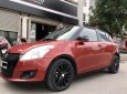 Suzuki Swift 2014 - Cần bán Suzuki Swift đời 2014, màu đỏ xe gia đình