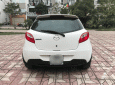 Mazda 2 2S 2014 - Gia đình cần bán Mazda 2 2S đời 2014, màu trắng, giá tốt