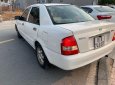 Mazda 323F 2004 - Cần bán gấp Mazda 323F GLX đời 2004, màu trắng