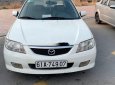 Mazda 323F 2004 - Cần bán gấp Mazda 323F GLX đời 2004, màu trắng