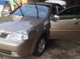 Daewoo Lacetti 2005 - Cần bán Daewoo Lacetti năm sản xuất 2005, màu vàng, xe nhập, 150tr