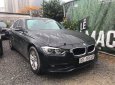 BMW 3 Series   2015 - Bán ô tô BMW 320i sản xuất 2015, màu đen, form 2016