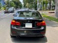 BMW 3 Series 2016 - Cần bán BMW 3 Series 320i sản xuất năm 2016, màu đen