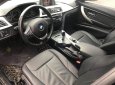 BMW 3 Series   2015 - Bán ô tô BMW 320i sản xuất 2015, màu đen, form 2016