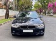 BMW 3 Series 2016 - Cần bán BMW 3 Series 320i sản xuất năm 2016, màu đen