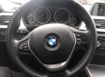 BMW 3 Series   2015 - Bán ô tô BMW 320i sản xuất 2015, màu đen, form 2016