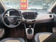 Hyundai Grand i10   2015 - Cần bán Hyundai Grand i10 2015, màu trắng, xe nhập  